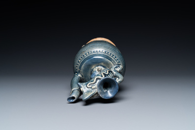 A very rare Vietnamese or Annamese blue-glazed 'shrimp' ewer, 15/16th C.