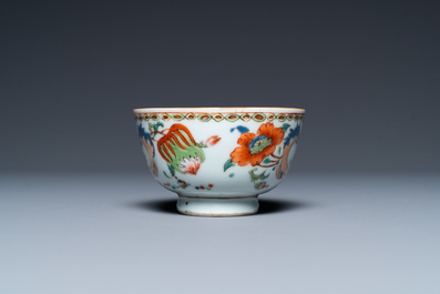 A Chinese famille rose 'Pompadour' cup and saucer, Yongzheng/Qianlong