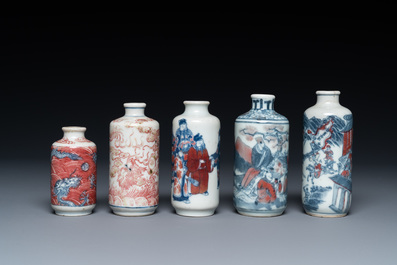 Five Chinese blue, white and copper-red snuff bottles, 18/20th C.