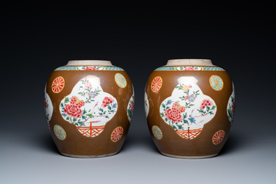 A pair of Chinese famille rose capucin brown-ground jars, Qianlong