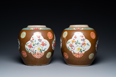 A pair of Chinese famille rose capucin brown-ground jars, Qianlong