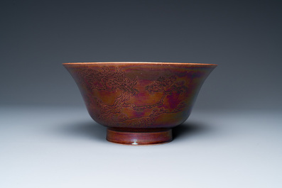 A Chinese aubergine-glazed bowl with incised design of cranes, Kangxi