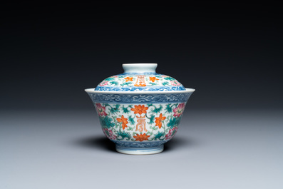 A Chinese famille rose bowl and cover, a 'dragon' plate and a celadon plate, 19th C.