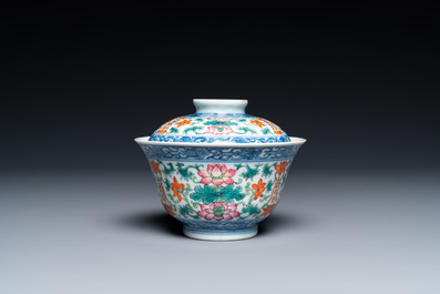A Chinese famille rose bowl and cover, a 'dragon' plate and a celadon plate, 19th C.