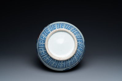 A Chinese blue, white and copper-red bottle vase with a deer and birds among blossoming branches, Daoguang