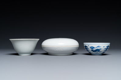 A Chinese white-glazed bowl, a small blue and white bowl and a covered box with incised design, Ming and Qing