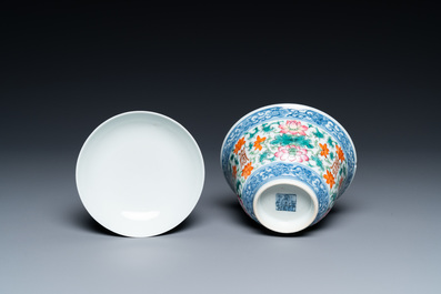 A Chinese famille rose bowl and cover, a 'dragon' plate and a celadon plate, 19th C.