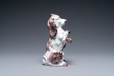 A Brussels faience manganese and white dog, 18th C.