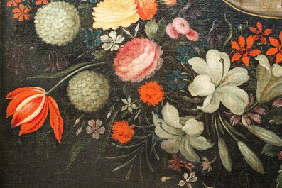Andries Daniels (c. 1580-1640), attributed to: 'The wedding of Mary and Joseph' in an oval medallion with a floral garland, oil on canvas