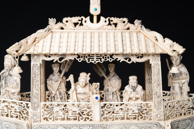 A Chinese carved ivory dragon boat on wooden stand, 19th C.