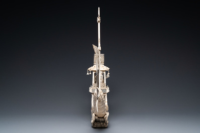 A Chinese carved ivory dragon boat on wooden stand, 19th C.