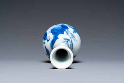 A Chinese blue and white bottle vase with a lady and her servant in a landscape, Transitional period