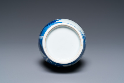 A Chinese blue and white bottle vase with a lady and her servant in a landscape, Transitional period