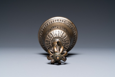 A Tibetan bronze bell, 16th C.