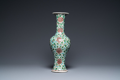 A Chinese verte biscuit 'peony scroll' vase, Ming