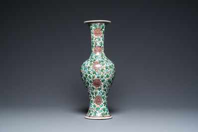 A Chinese verte biscuit 'peony scroll' vase, Ming