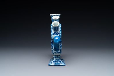 A Dutch Delft blue and white heart-shaped tulip vase with putti, 1st half 18th C.