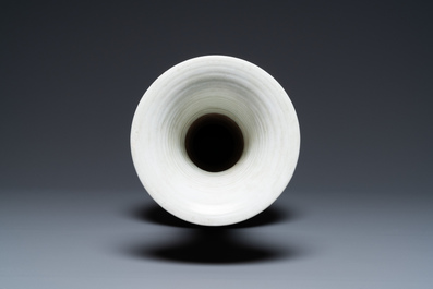 A Chinese verte biscuit 'peony scroll' vase, Ming