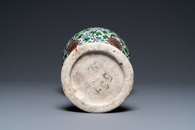 A Chinese verte biscuit 'peony scroll' vase, Ming