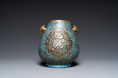 A Chinese 'robin's egg and imitation bronze'-glazed 'hu' vase, Qianlong mark, 19th C.