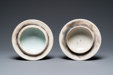 A pair of Chinese wucai 'galloping horses' vases and covers, Transitional period