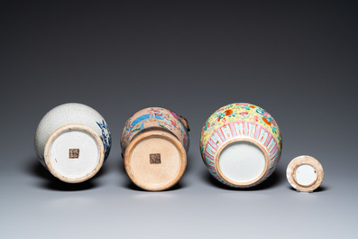 Deux vases en porcelaine de Chine dite 'de Nankin' et un pot couvert en famille rose, 19&egrave;me