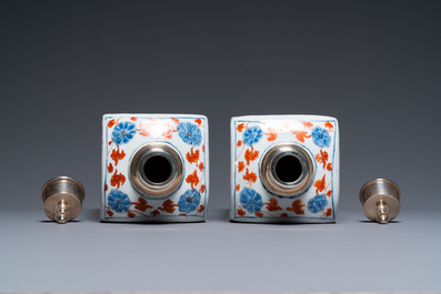 A pair of Chinese square Imari-style bottles with silver lids, Kangxi