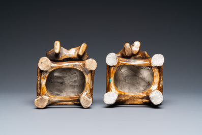 A pair of Chinese partly gilded seated figures, Zeng Long Sheng Zao mark, 20th C.