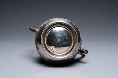 A Chinese silver teapot with birds among blossoming branches, 19th C.