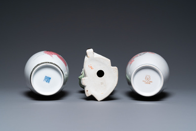 A Chinese famille rose figure and two vases, 20th C.