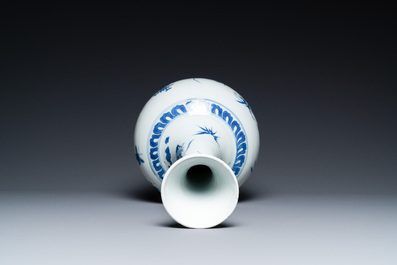A rare Chinese blue and white bottle vase with a tiger and two butterflies, Transitional period