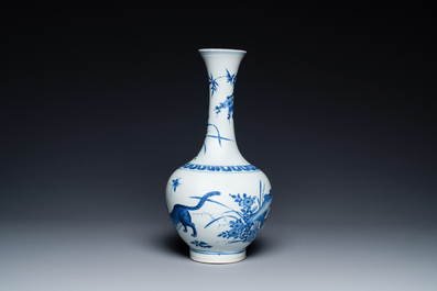 A rare Chinese blue and white bottle vase with a tiger and two butterflies, Transitional period