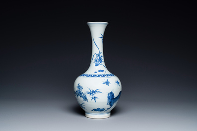 A rare Chinese blue and white bottle vase with a tiger and two butterflies, Transitional period