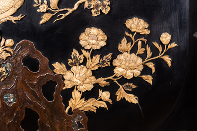 A large Japanese wooden screen with a central gilt-lacquered and ivory-inlaid panel, Meiji