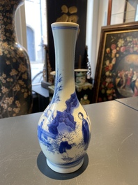 A Chinese blue and white bottle vase with a lady and her servant in a landscape, Transitional period