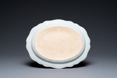 A Chinese famille rose coffee pot, a mug and an oval dish, Qianlong