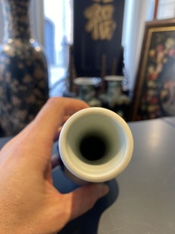 A Chinese blue and white bottle vase with a lady and her servant in a landscape, Transitional period