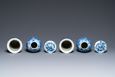 A Chinese blue and white four-piece garniture, Kangxi mark, 19th C.
