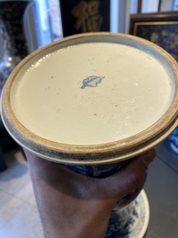 A Chinese blue, white and copper-red 'gu' vase with lotus scrolls, Kangxi