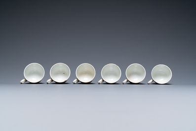 Six Chinese blue and white cups and saucers, six famille rose cups and five saucers, Kangxi/Qianlong