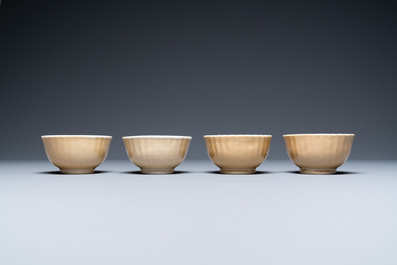 Thirteen Chinese famille rose saucers and twelve cups, Qianlong