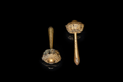 Three Vietnamese golden earrings, Champa, 14th C. and a pair of later Chinese gilded earrings, 18/19th C.