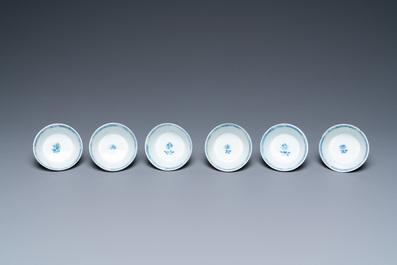 Six Chinese blue and white cups and saucers, six famille rose cups and five saucers, Kangxi/Qianlong