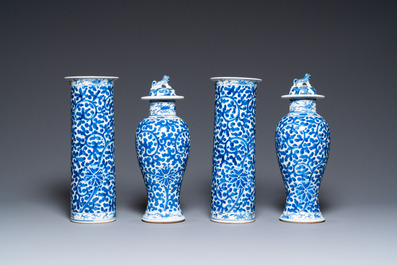 A Chinese blue and white four-piece garniture, Kangxi mark, 19th C.