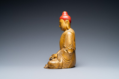 A Vietnamese or Japanese gilded and lacquered wooden Buddha, 19th C.