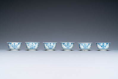 Six Chinese blue and white cups and saucers, six famille rose cups and five saucers, Kangxi/Qianlong