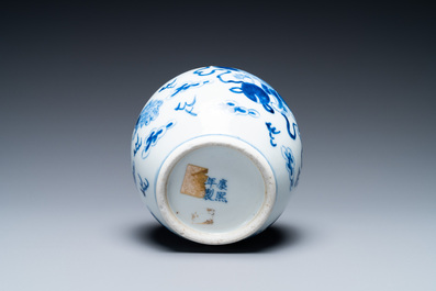 A Chinese blue and white 'Buddhist lions' brush washer, Kangxi mark, 19th C.