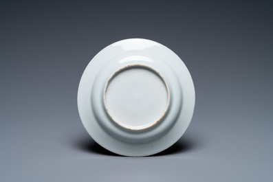 A Chinese famille verte cup and saucer, Kangxi