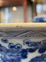 A Chinese blue, white and copper-red 'gu' vase with lotus scrolls, Kangxi