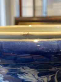 A pair of Chinese blue and white 'dragon and peony' vases, 19th C.